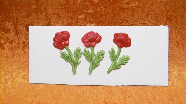 Wachsmotiv drei rote  Röschen     9933